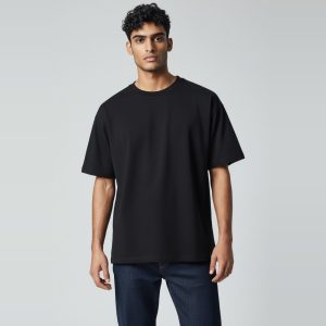 Model wearing black plain t-shirt, colour code #1A1A1A – Bulk Cloth Store