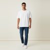 Model wearing off-white plain t-shirt, colour code #F0EEE9 – Bulk Cloth Store