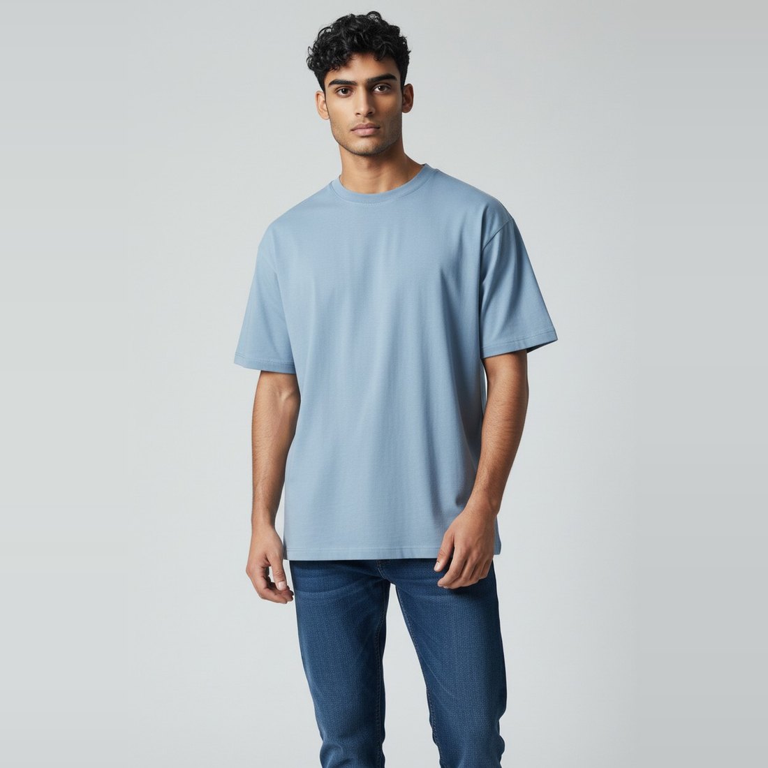 Model wearing patina blue plain t-shirt, colour code #7BA7BC – Bulk Cloth Store